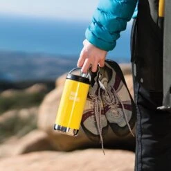 Klean Kanteen Insulated TK Wide With Café Cap 355ml - Brushed Steel -Camping Discounter K12TKWPCC BC hand rocks lifestyle e1537579 685c 41b5 ab6e 47182ddd9812